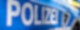 An der Tür eines Streifenwagens steht der Schriftzug «Polizei».